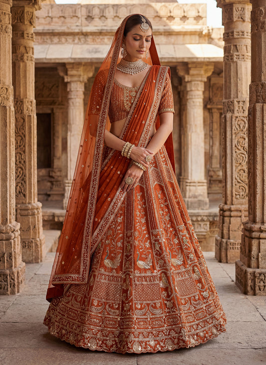 Lehenga choli Orange  colour double dupatta combine peacock hand work designer