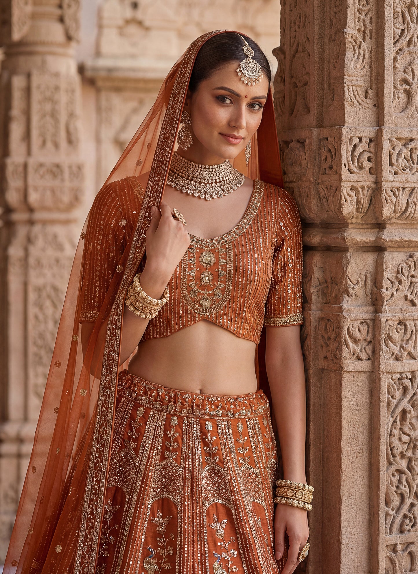 Lehenga choli Orange  colour double dupatta combine peacock hand work designer