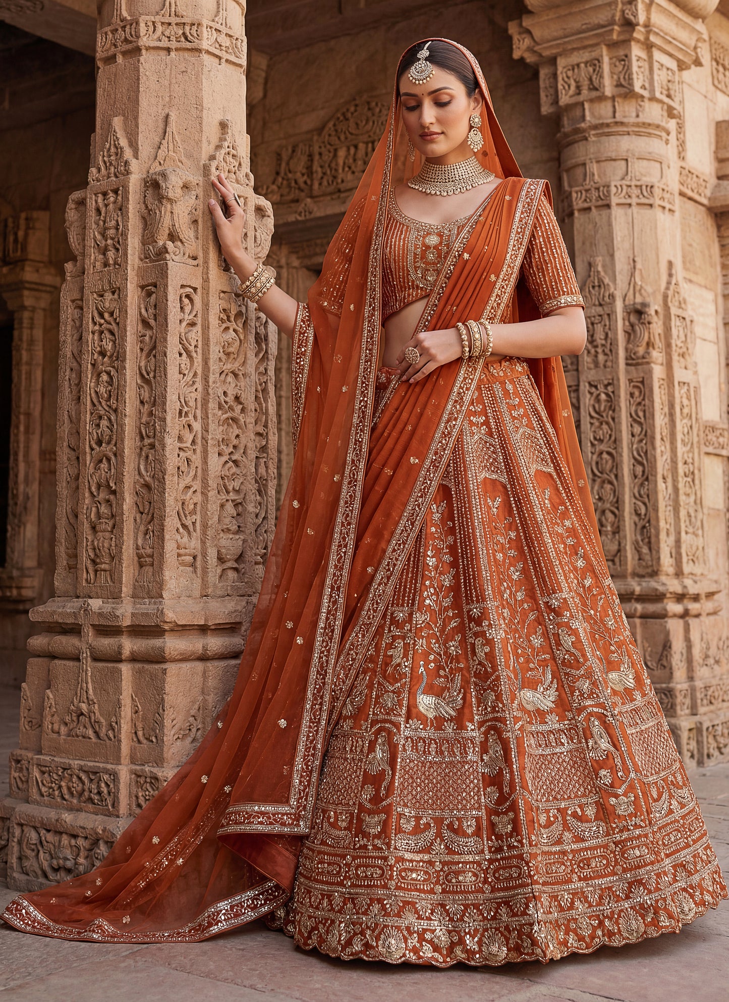 Lehenga choli Orange  colour double dupatta combine peacock hand work designer