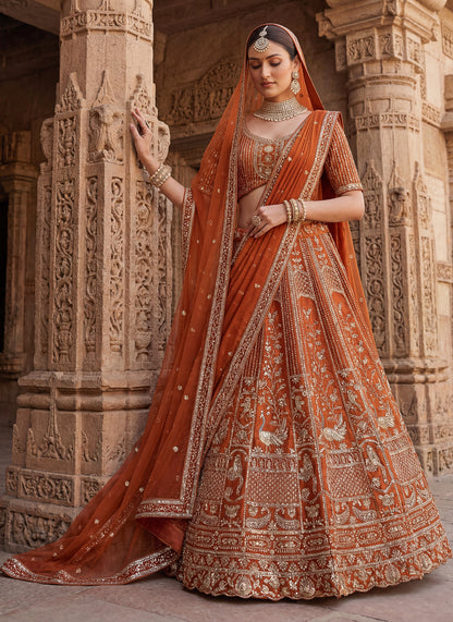 Lehenga choli Orange  colour double dupatta combine peacock hand work designer