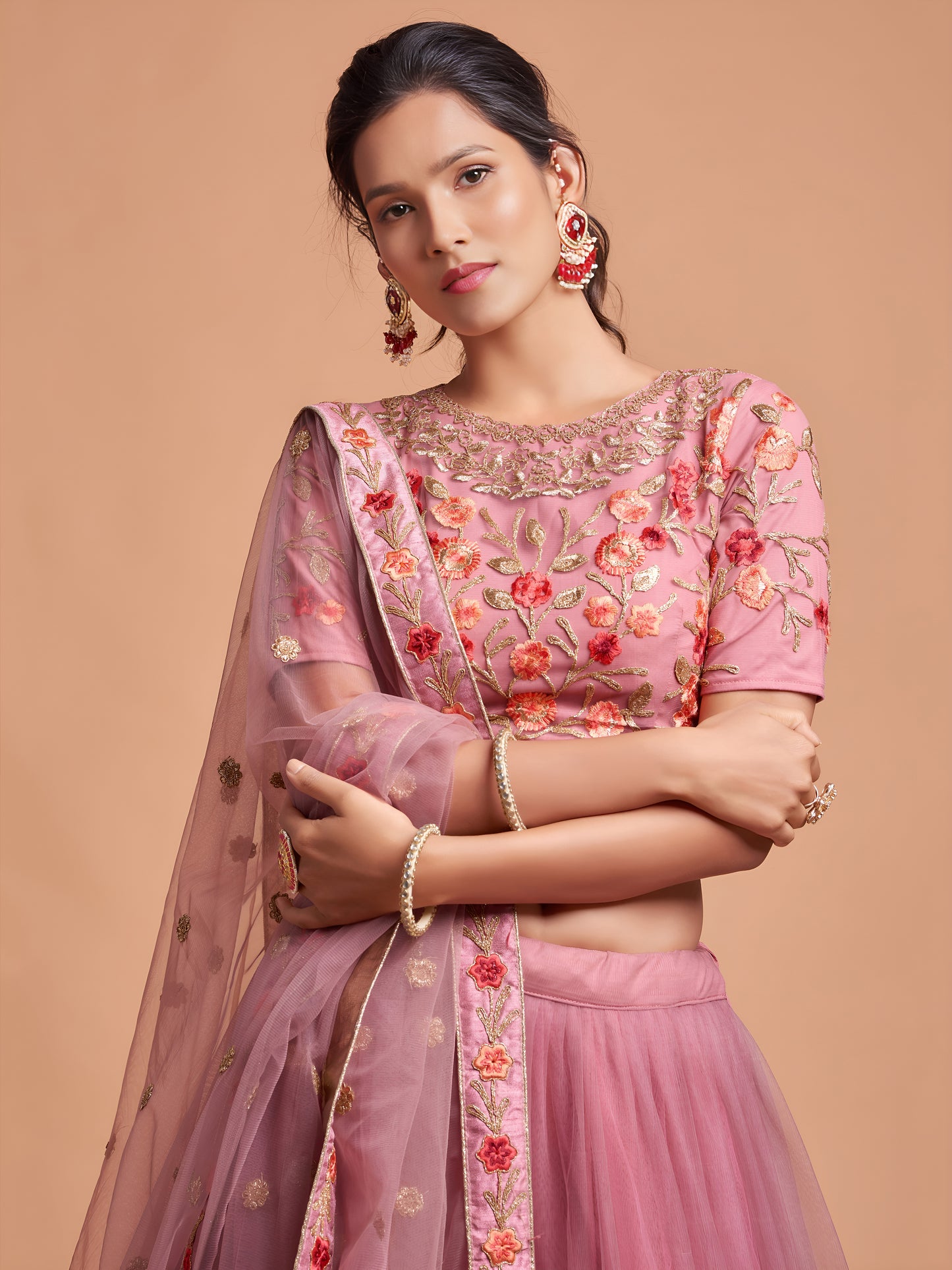 Dusty Pink Thread Embroidered Net Wedding Wear Lehenga Choli