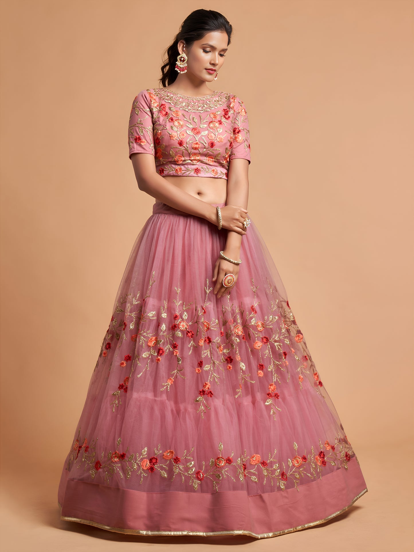 Dusty Pink Thread Embroidered Net Wedding Wear Lehenga Choli
