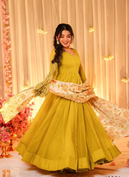 yello stunning Beautiful  Ethnic wear  flared gown set with contrast matching dupatta collection