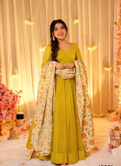 yello stunning Beautiful  Ethnic wear  flared gown set with contrast matching dupatta collection