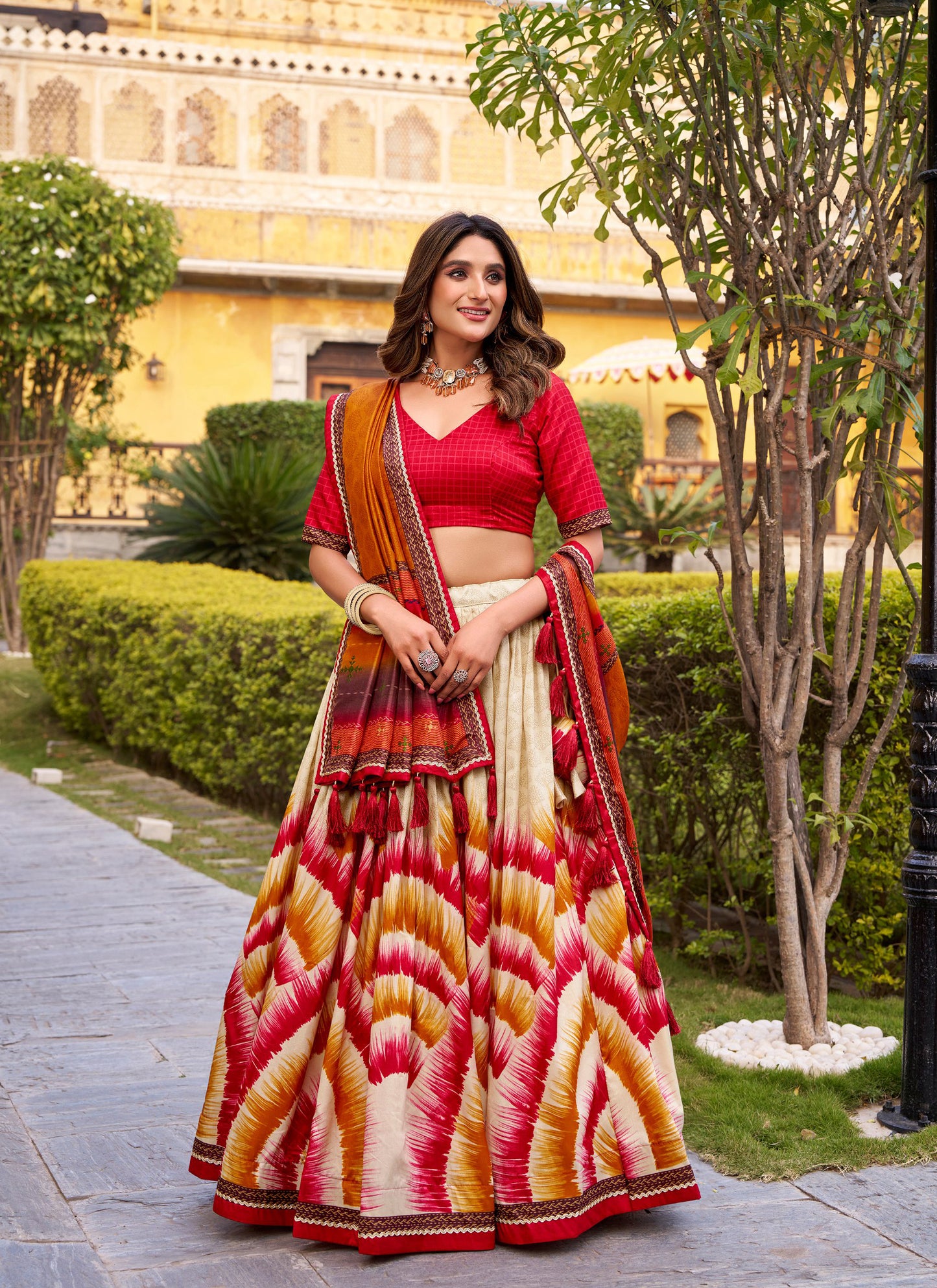 Red colour Tasar Silk masterpiece dipped in artistic tie-dye prints,