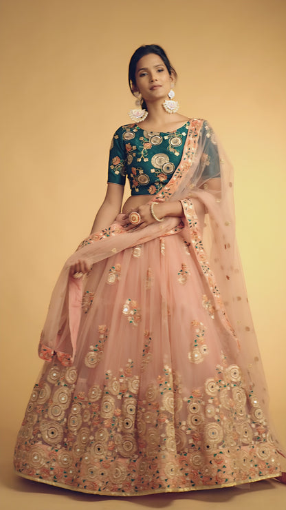 Peach Thread Embroidered Net Party Wear Lehenga Choli